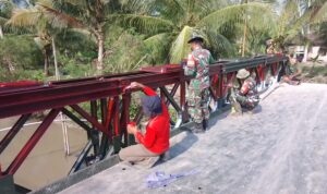 Sinergi Prajurit dan Rakyat, Jembatan Penghubung Dua Desa di Asahan Resmi Beroperasi a bb a de