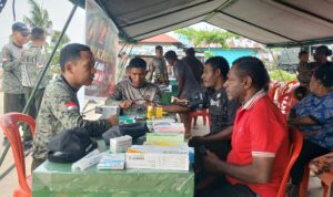 Sambut HUT TNI ke-81, Yonif TP 864/NN Bagikan 100 Sembako dan Buka Layanan Kesehatan Gratis WhatsApp Image at