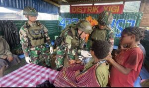 Satgas TNI Bangkitkan Semangat Anak-Anak Yigi Dalam Peringatan Hari Anak Nasional